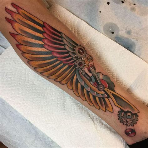 Hermes wings calf tattoo